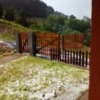 Fabricación y colocación de portilla de madera segun foto adjunta (una de las hojas)