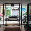 Suministro e instalación de puerta de cristal para portal de comunidad