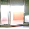 Puerta corredera aluminio y persiana comedor