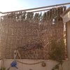 Instalación de mimbre en reja de terraza