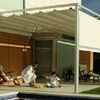 Instalación de toldo para cubrir techo y frontal en terraza de vivienda