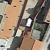 Pavimentar un patio exterior, que ahora es de graba y tierra