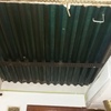 Pintar unos 7 metros cuadrados con pintura impermeabilizante una tejadillo y poner unos 6 metros cuadradod de techo desmontable