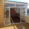 Cerrar media terraza en aluminio y cristal de un atico