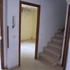 Colocar baldosas en 3 habitaciones y escaleras