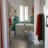 Cambio jacuzzi por ducha; modificación de una habitación